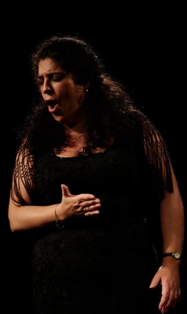 Jasmine Villalobos singing on stage